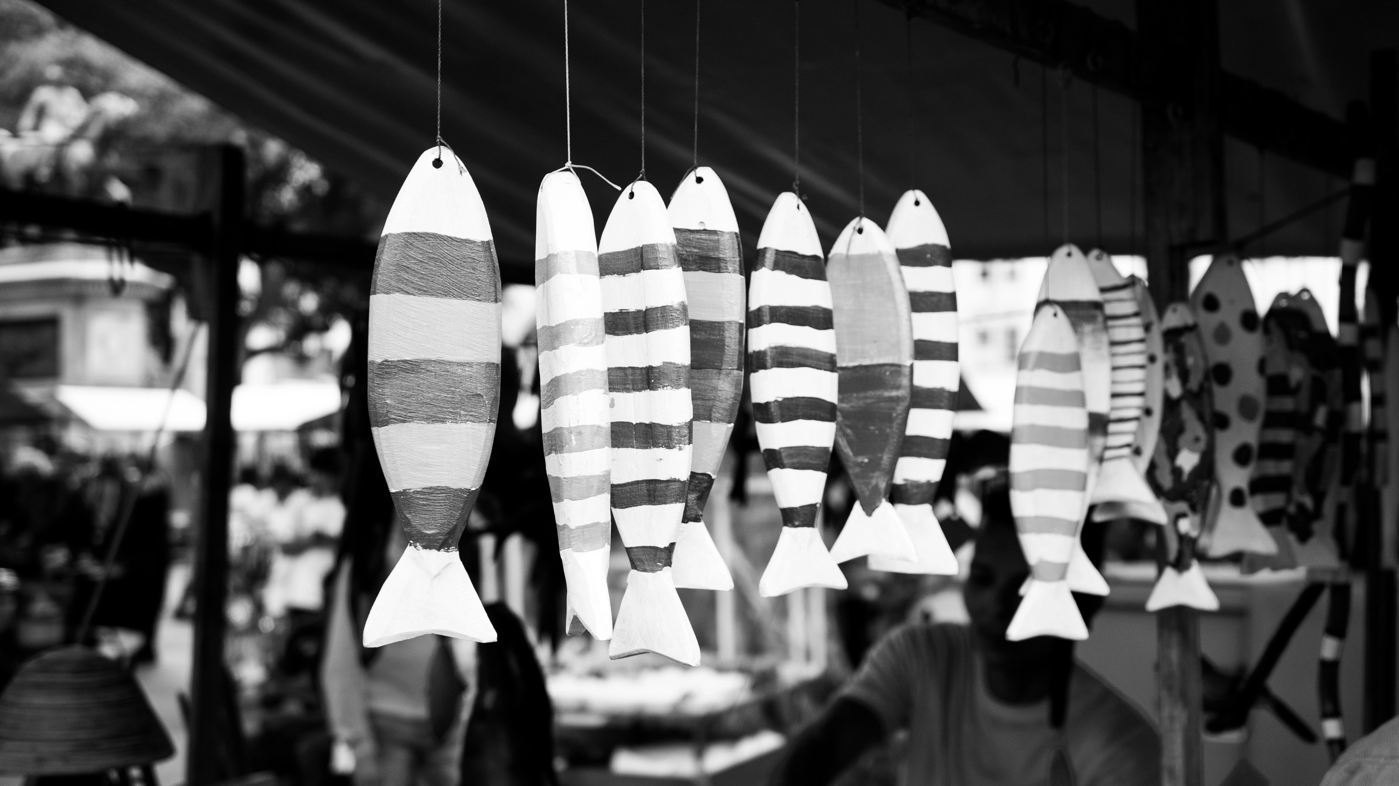 Handcrafted wooden fish on display